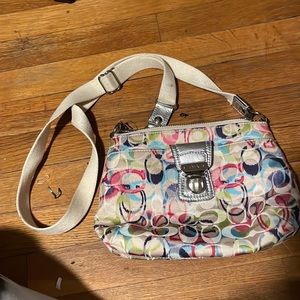 Cream/ multicolored Coach cross body bag.